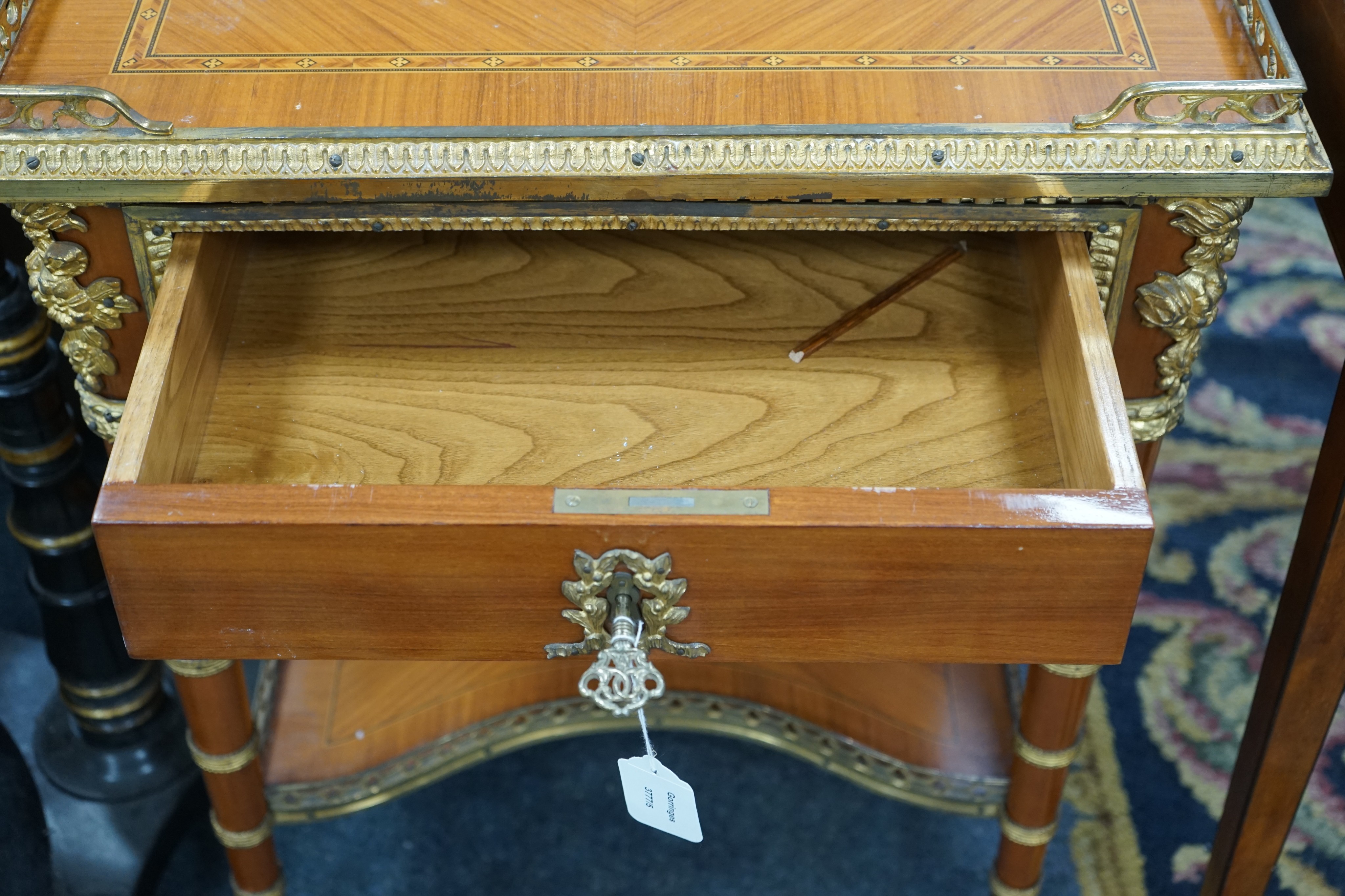 A Louis XVI design gilt metal mounted side table, width 60cm, depth 44cm, height 74cm